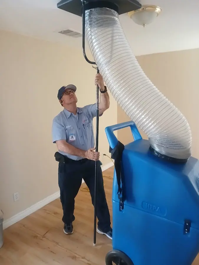 Furnace Tune-Up technician using HEPA equipment in Bethel Park